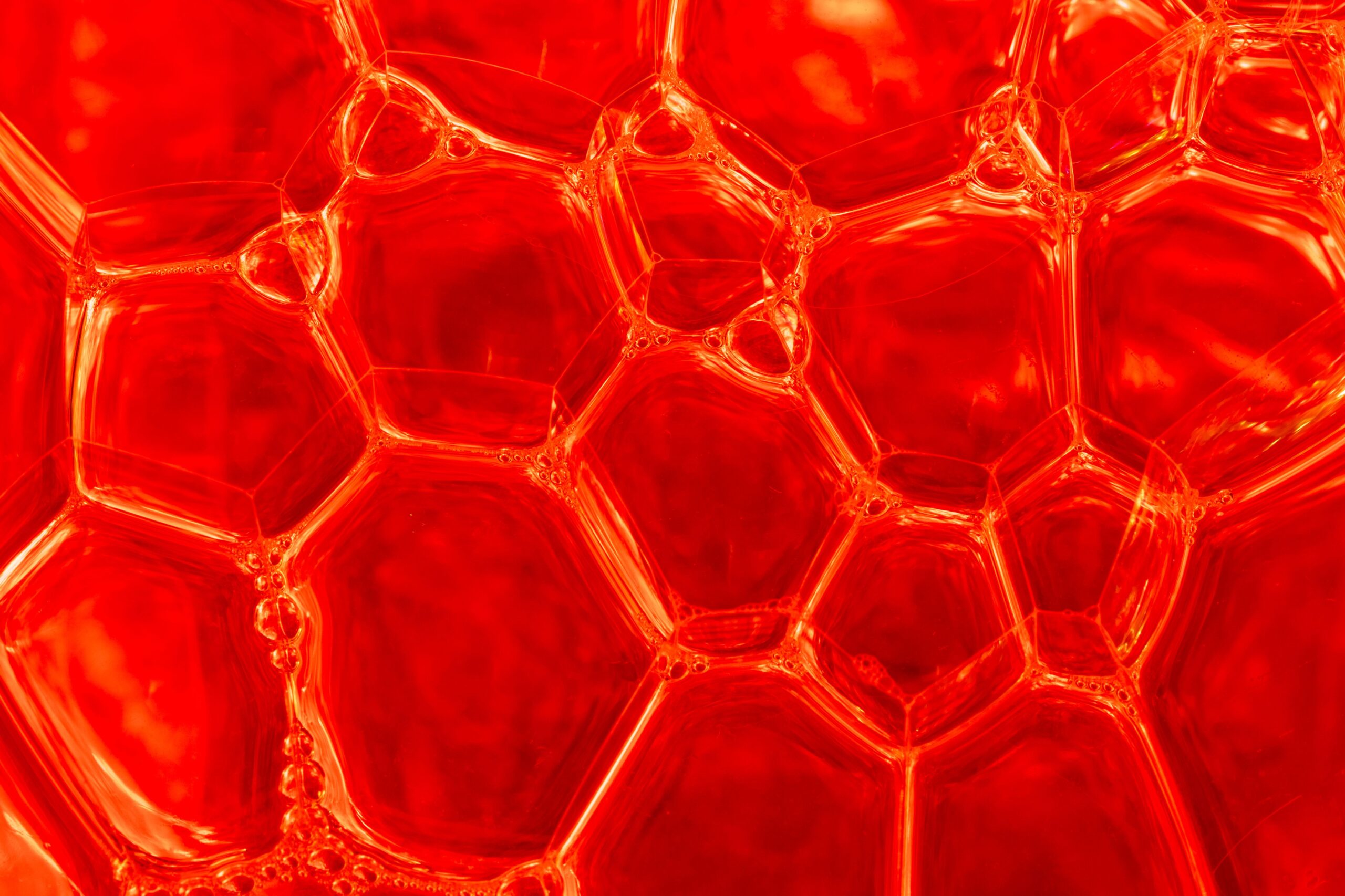 Close-up of liquid surfactants being processed in a chemical manufacturing facility laboratory